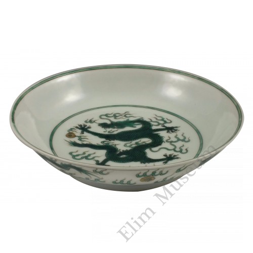 1049 A famille rose dish with dragon chasing peal  